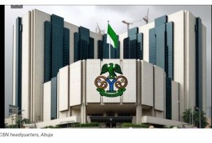 Central Bank of Nigeria headquarters in Abuja representing Nigeria's banking and financial sector.